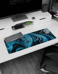Playful 32x12 inches mouse pad showcasing swirling blue and black waves with pixelated dinosaurs, perfect for a fun desk setup.