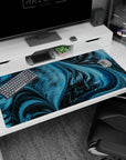 Large 40x20 inches desk pad showcasing blue and black waves with pixelated dinosaurs, bringing a visually stunning cosmic theme to your workspace.