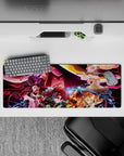 Anime mouse pad 32x12 inches featuring Demon Slayer characters Tanjiro, Nezuko, Zenitsu, Inosuke battling Daki.