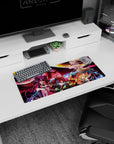 Demon Slayer anime mouse pad, 28x12 inches, featuring Tanjiro, Nezuko, Zenitsu, Inosuke vs. Daki with intense action backdrop.