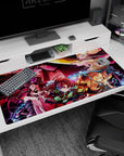 Anime mouse pad 40x20 inches featuring Demon Slayer squad: Tanjiro, Nezuko, Zenitsu, Inosuke vs. Daki in dynamic battle.