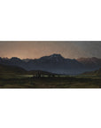 Mouse pad featuring wilderness landscape, 36x16 inches, with mountains and starry sky for a tranquil and serene desk vibe.