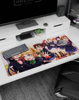 Umi Sonoda hugs Eli Ayase as Nico reaches out on anime desk pad 36x16 inches, cute group scene.