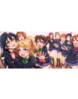 Love Live anime girl desk pad 36x16 inches with school idols in navy uniforms and drifting petals.