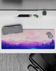Cosmic 32x12 mouse pad featuring soft pinks and purples, with dreamy cosmic landscapes for a calm and functional design