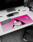 Close-up anime girl blushing glare with sweat-drop detail on desk pad 36x16 inches, neon triangle.