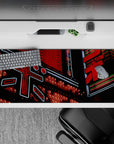 Striking 36x16 desk pad highlights kanji neon signs with intricate details and vivid red-and-white glow