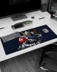Gundam Barbatos 36x16 inches anime desk pad, horns and blades out, gold accents amid sparks on a dark background.