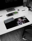 Silver-haired fox-eared anime heroine desk mat 28x12 inches, wind-swept hair over dark backdrop.