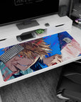 Large 40x20 inches mouse pad featuring Chainsaw Man design, with Denji's intense battle and Makima’s reflection in the bloodstained blade for dramatic depth.