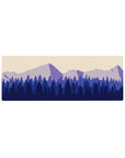 Compact 32x12 inches mouse pad with serene mountain layers in soft purples and blues, perfect for a tranquil desk effect.