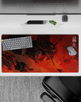 Impactful 32x16 desk pad combines explosive red hues, shadowy tones, and intricate linework for visually striking yet functional visuals