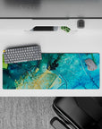 Peaceful 32x12 mouse pad featuring turquoise, deep blue, and golden flecks, perfect for an ocean-inspired desk design