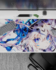 Cozy winter anime desk pad 40x20 inches in icy blues with sapphire eyes and dreamy floral accents.