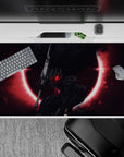40x20 inches desk pad showcasing Guts in his Berserker Armor, surrounded by a blood-red eclipse, capturing the raw intensity of the Black Swordsman for your desk setup.