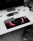 Berserk mouse pad, 28x12 inches, with Guts in his Berserker Armor beneath a blood-red eclipse, perfect for adding intensity and fierce energy to your workspace.