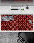 Dynamic 32x16 desk mat combines orange and red shades with sharp hexagonal lines for impactful yet stylish visuals