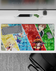 Anime mouse pad 32x16 inches featuring KonoSuba characters Aqua, Darkness, Megumin, Kazuma in vibrant, chaotic collage.