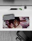 Mouse pad featuring Demon Slayer's Kokushibo, 28x12 inches. Showcases six glaring eyes, blood-red blades, and eerie pink-gray tones.