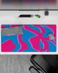 32x16 inches mouse pad with retro wave-inspired splashes of vibrant pink, deep blue, and neon purple, creating an electric and dynamic atmosphere.