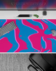 40x20 inches mouse pad showcasing retro wave-inspired design with vibrant pink, deep blue, and neon purple splashes for electric vibes.