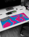 Artistic 36x16 inches mouse pad showcasing retro wave-inspired splashes of pink, deep blue, and neon purple for bold contrasts and electric energy.