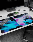 Large 40x20 inches desk pad showcasing electric blue, pink, and black swirls in a bold, cosmic-inspired design, ideal for modern workspaces.