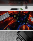 Evangelion-inspired 40x20 inch desk pad featuring EVA Unit-01 in beast mode, vivid reds and oranges dominate the scene.