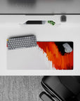 Compact 28x12 desk mat highlights vibrant orange and white tones for immersive fiery vibes and creative focus