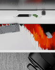 Striking 36x16 desk pad highlights blazing orange and white tones with intricate flame-like details in stunning artistry
