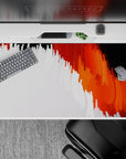 Dynamic 40x20 desk pad showcases abstract flame patterns with vibrant tones for an inspiring workspace aesthetic
