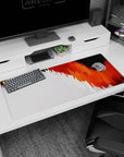 Vivid artwork on 36x16 desk mat captures the essence of movement and energy with bold, fiery aesthetics