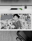 Bold 32x16 mouse pad combines Luffy's adventure with sleek manga panel design for impactful visuals