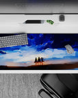 36x16 inches mouse pad with Eren, Mikasa, and Armin, featuring a painterly sky design symbolizing hope and adventure.