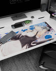 Large 40x20 inches mouse pad featuring Rem design, with scattered blue rose petals and a peaceful pose for a tranquil, elegant desk aesthetic.