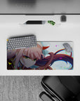 Compact 28x12 desk mat highlights Zero Two's intensity and beauty for Darling in the Franxx enthusiasts