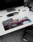 Small but impactful 32x12 desk mat showcases Zero Two's captivating close-up with striking color artistry