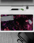 Cosmic 32x16 mouse pad featuring swirling purple and magenta tones on a black backdrop for a serene, space-inspired aesthetic