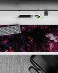 Galactic 36x16 desk pad showcasing cosmic purple and magenta swirls against a black background for a mysterious celestial feel