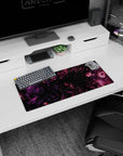 Space-inspired 28x12 mouse pad showcasing galaxy swirls in purple and magenta for a cosmic touch to your workspace