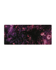 Galactic 28x12 mouse pad featuring purple and magenta swirls on a black background for a serene and celestial workspace vibe