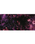Cosmic 36x16 desk pad with purple and magenta swirls on a black background, perfect for creating a serene, galaxy-inspired workspace