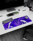 Artistic 32x12 inches mouse pad featuring vibrant purple design, with swirling patterns for a creative, focused, and dynamic workspace aesthetic.