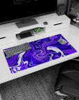 Modern 32x16 inches mouse pad featuring vibrant purple design, with rich swirling patterns to enhance your workspace with energy and creativity.