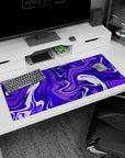 Artistic 36x16 inches mouse pad featuring vibrant purple design, with rich swirling patterns for a touch of mystery and creativity in your workspace.