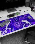 Large 40x20 inches mouse pad featuring vibrant purple design, with rich swirling patterns for a dynamic, calming, and creative workspace aesthetic.