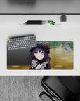 Purple hair and black lace, dreamy violet-eyed anime girl mouse pad 28x12 inches with calm green backdrop.
