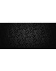 Desk pad featuring Midnight Elegance design, 36x16 inches, with black floral elements and delicate swirls for a luxurious and sophisticated workspace.