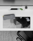 28x12 inches mouse pad with geometric grayscale design, showcasing varying shades of black, gray, and white with sharp angles for a modern look.