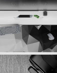 36x16 inches desk pad with geometric grayscale design, blending black, gray, and white shades with sharp angles for a minimalist, refined workspace.